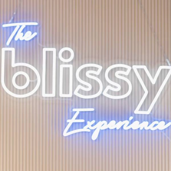 the blissy experience podcast neon logo